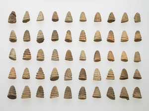 Clay statues (Curls on the head of the Buddha), (Excavated from a temple site of Sai-no-o, Tottori)